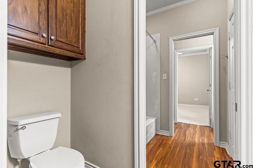 100 Lantana Road Gilmer, TX 75644 - Photo 21 of 30 a bathroom with a toilet and a shower