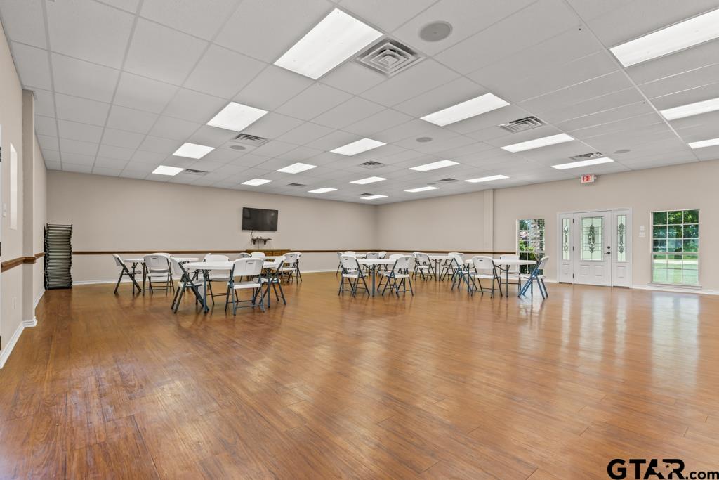 100 Lantana Road Gilmer, TX 75644 - Photo 25 of 30 a lobby with furniture and wooden floor