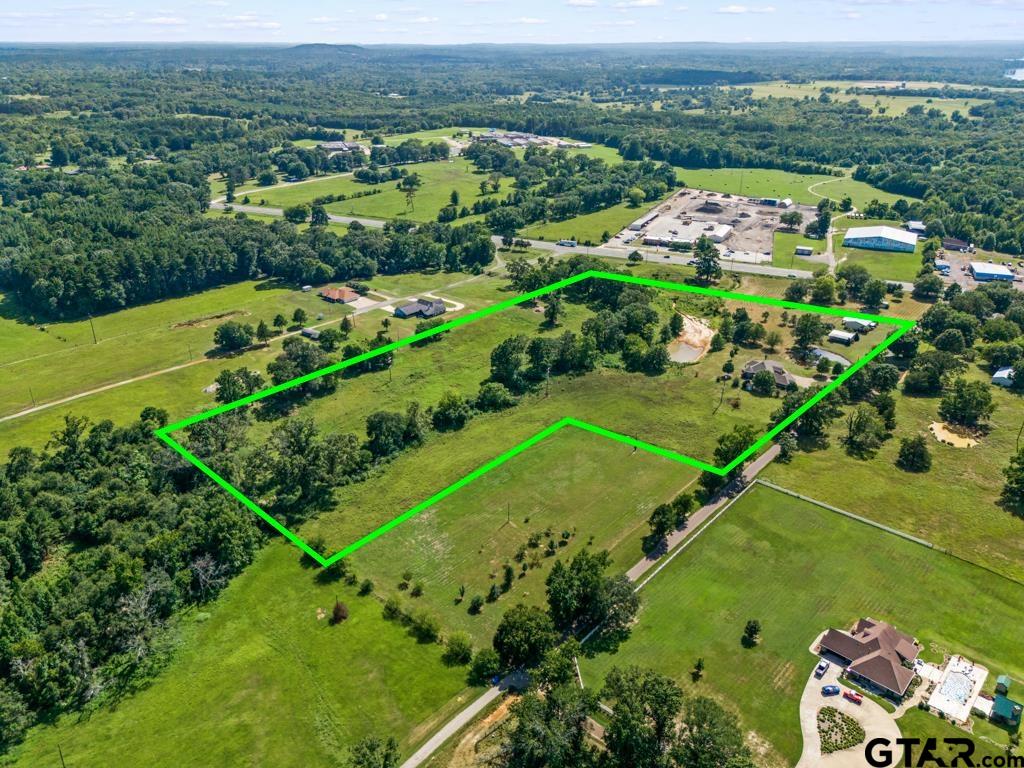 100 Lantana Road Gilmer, TX 75644 - Photo 5 of 30 an aerial view of a residential houses with outdoor space and trees all around