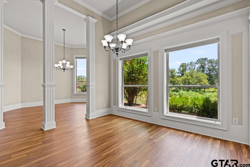100 Lantana Road Gilmer, TX 75644 - Photo 10 of 30 a view of an empty room with wooden floor and a window