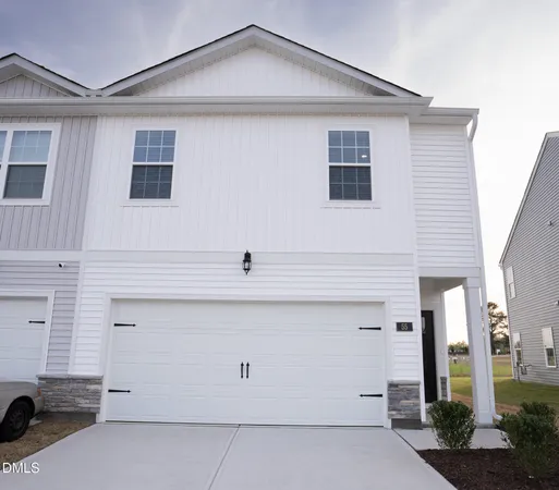 a view of a house with garage
