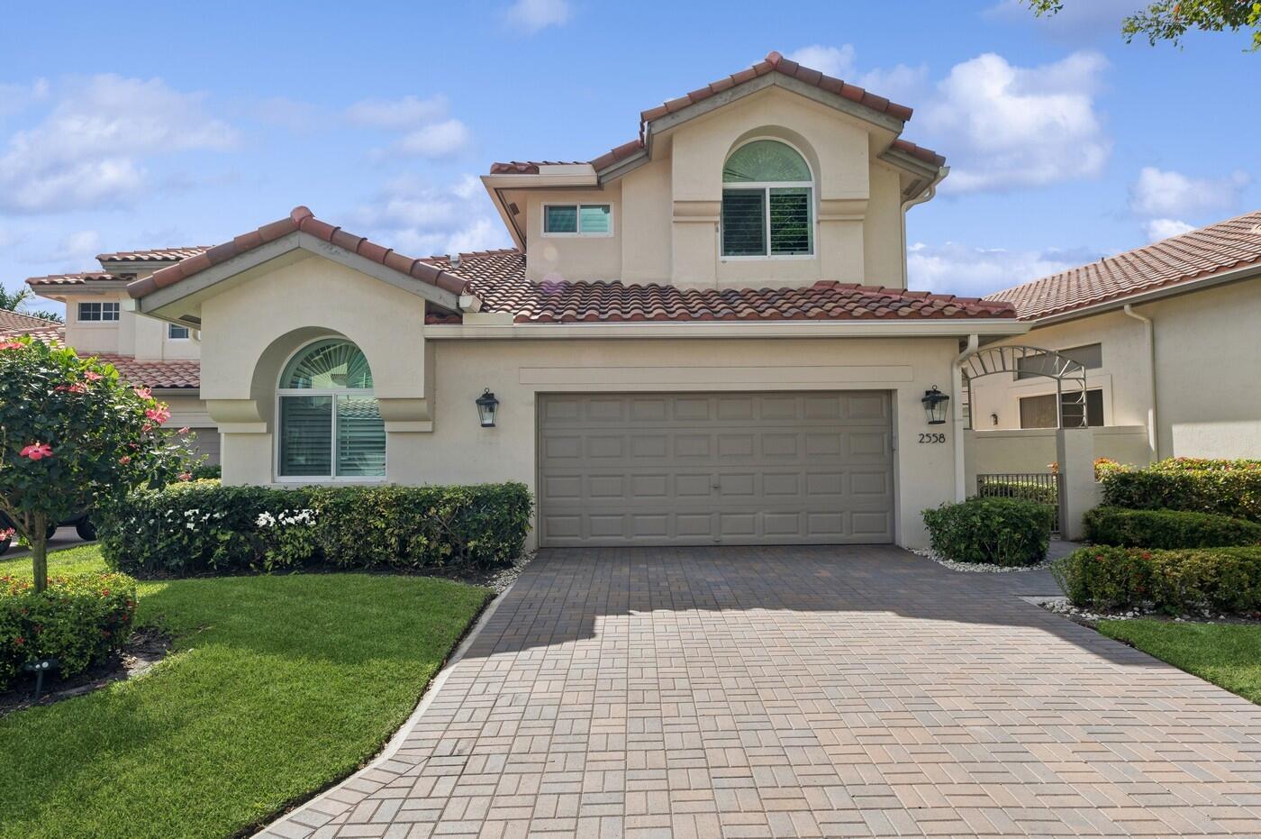 2558 Northwest 52nd Street Boca Raton, FL 33496 - Photo 1 of 27 Front of Home
