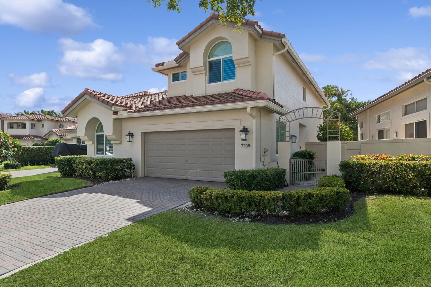 2558 Northwest 52nd Street Boca Raton, FL 33496 - Photo 2 of 27 Front of Home