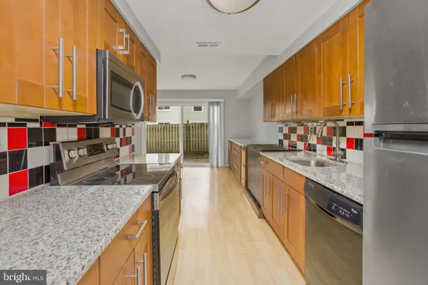 a bathroom with a toilet and a sink
