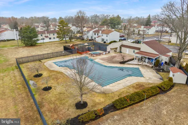 swimming pool view with sitting space