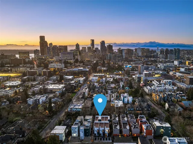 a view of a city with tall buildings