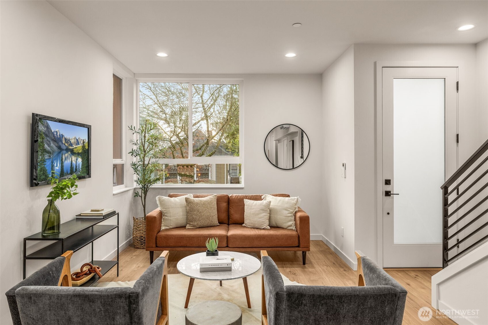 914 A 15th Avenue Seattle, WA 98122 - Photo 7 of 35 a living room with furniture and a large window