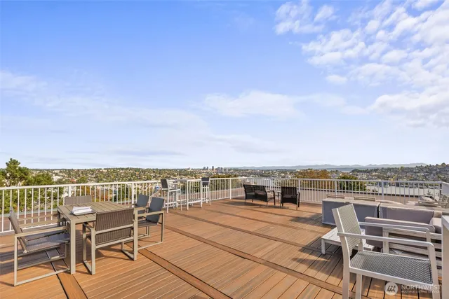 a view of roof deck with patio