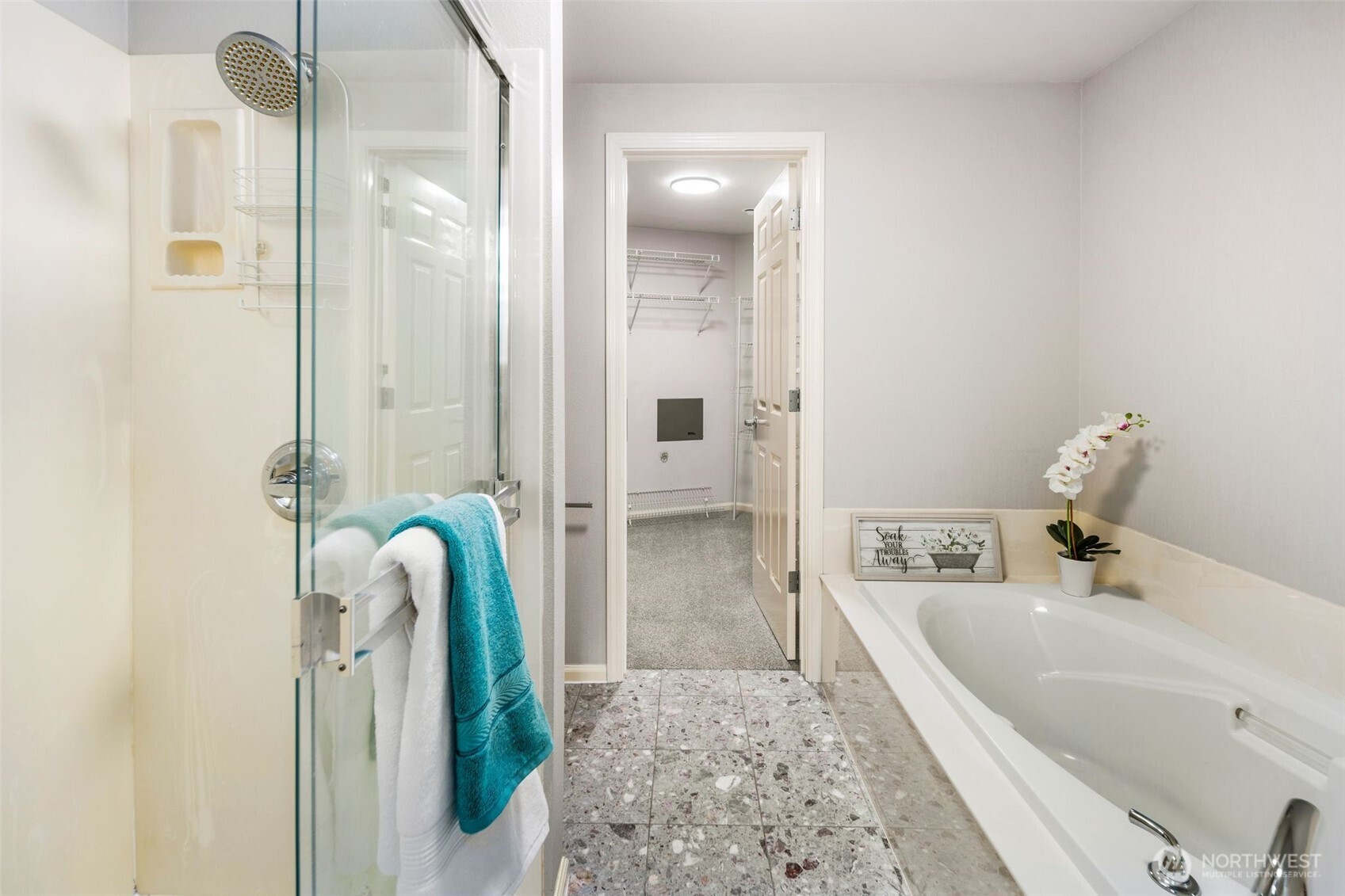 559 McGraw Street, Unit 402 Seattle, WA 98109 - Photo 24 of 39 a bathroom with a tub sink and mirror