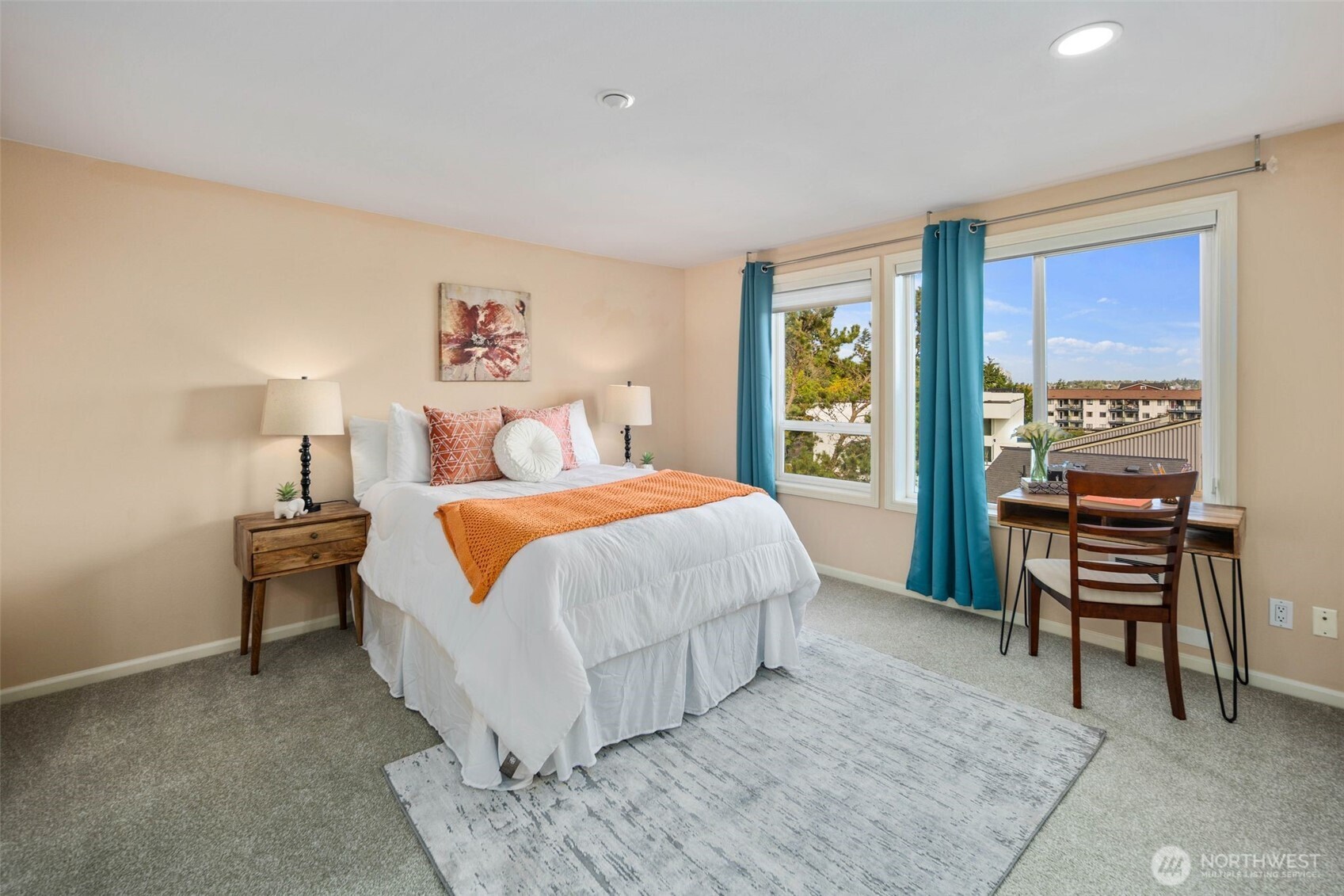 559 McGraw Street, Unit 402 Seattle, WA 98109 - Photo 25 of 39 a bed room with a bed and a chair