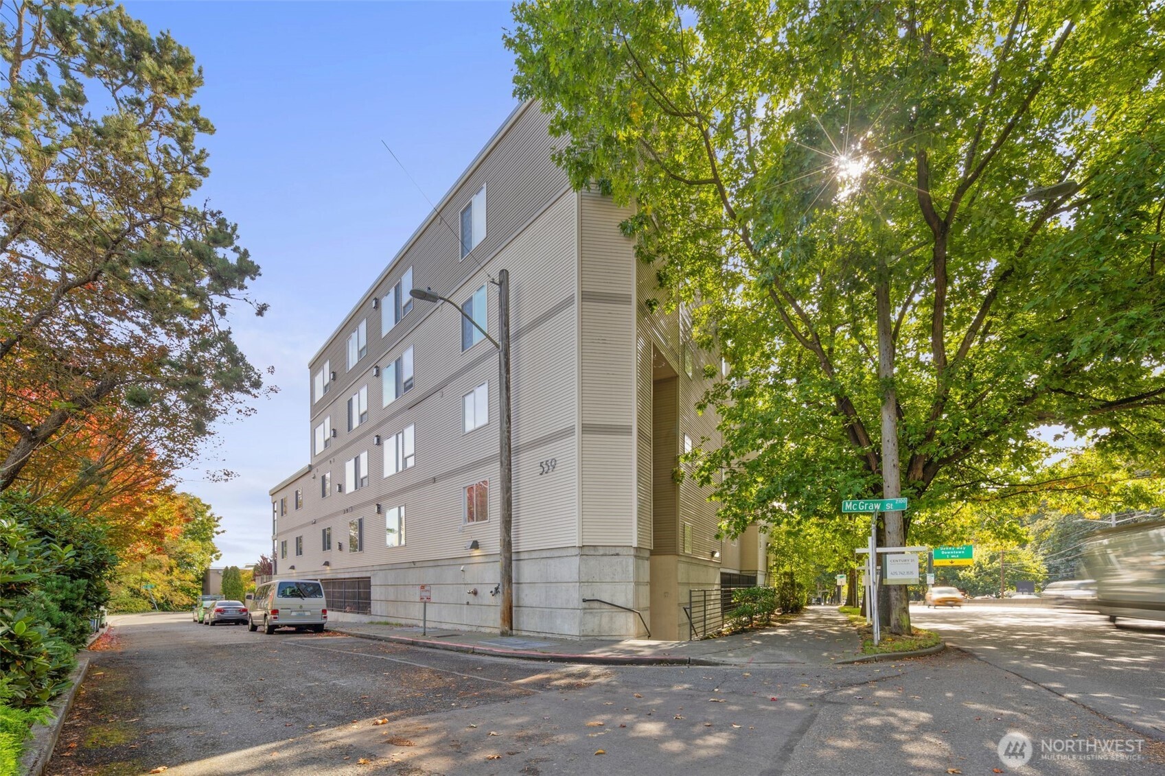 559 McGraw Street, Unit 402 Seattle, WA 98109 - Photo 33 of 39 a view of a street with a building in the background