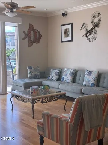 a living room with furniture and a couch