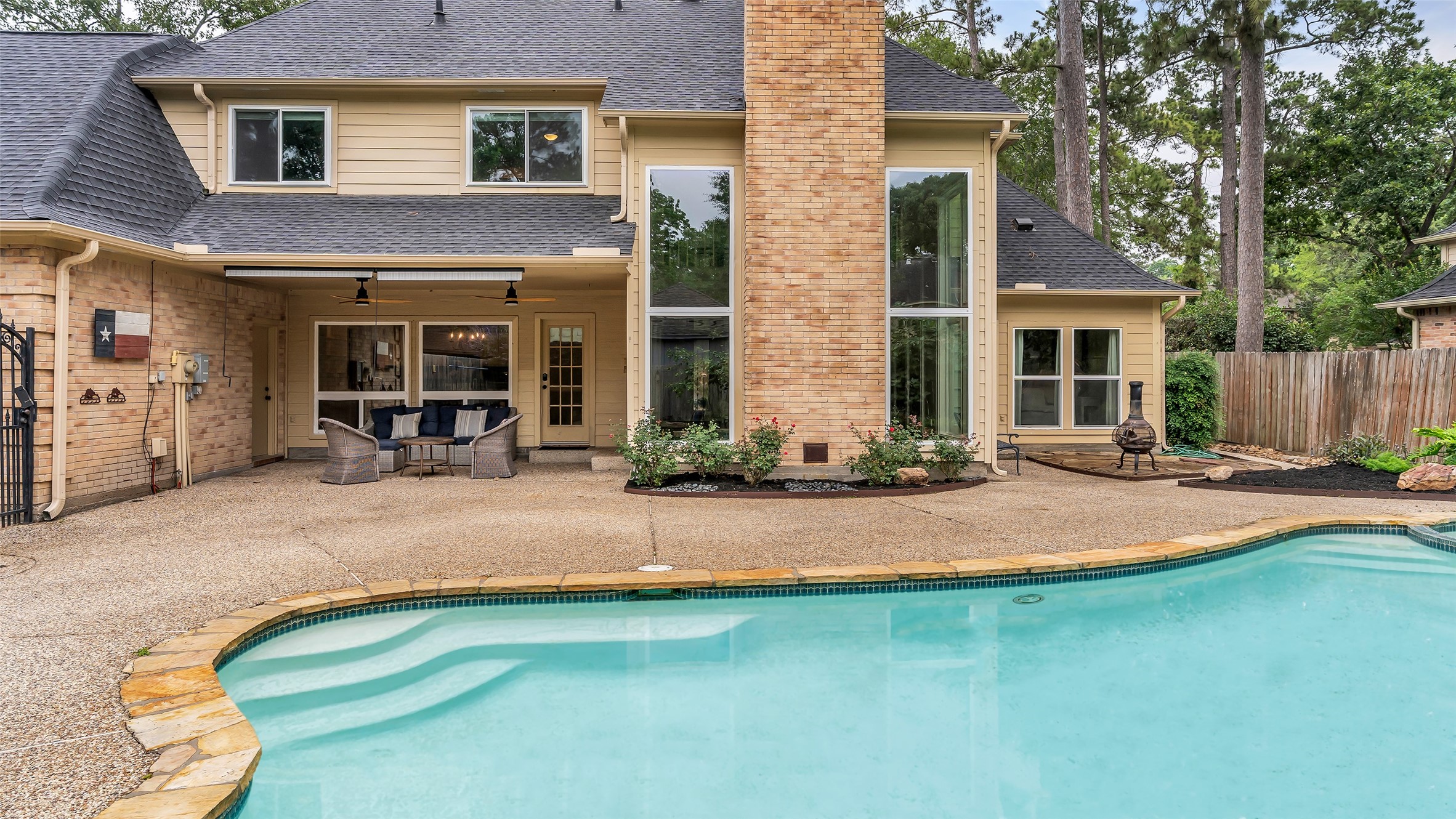 2607 Laurel Ridge Drive Houston, TX 77345 - Photo 42 of 47 front view of a brick house with a yard