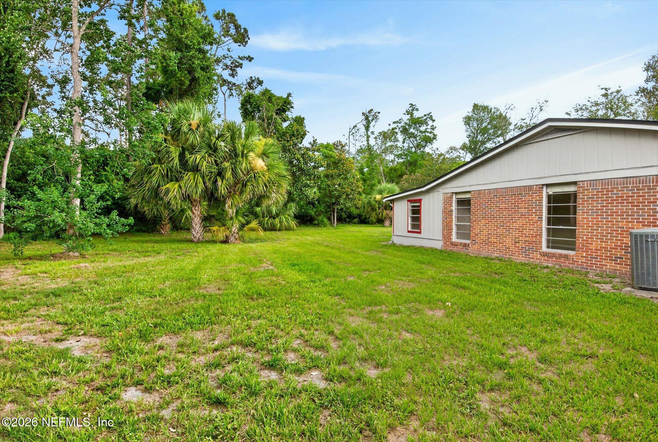 2705 Navajo Road Orange Park, FL 32073 - Photo 56 of 58 a view of a house with backyard