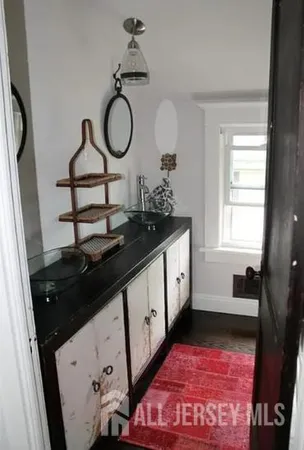 a kitchen with a sink and a window