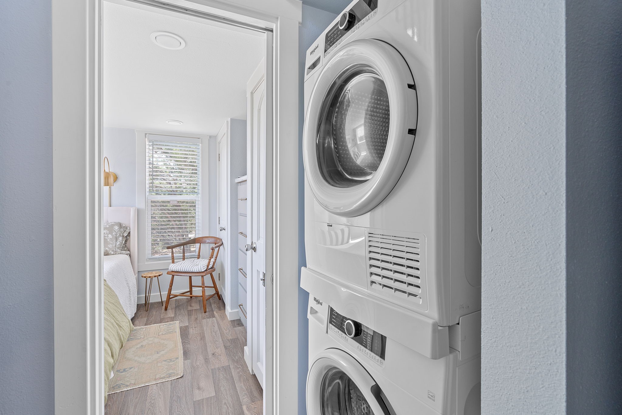 635 Ivean Pearson Road Lago Vista, TX 78645 - Photo 16 of 24 a view of a hallway with washer and dryer