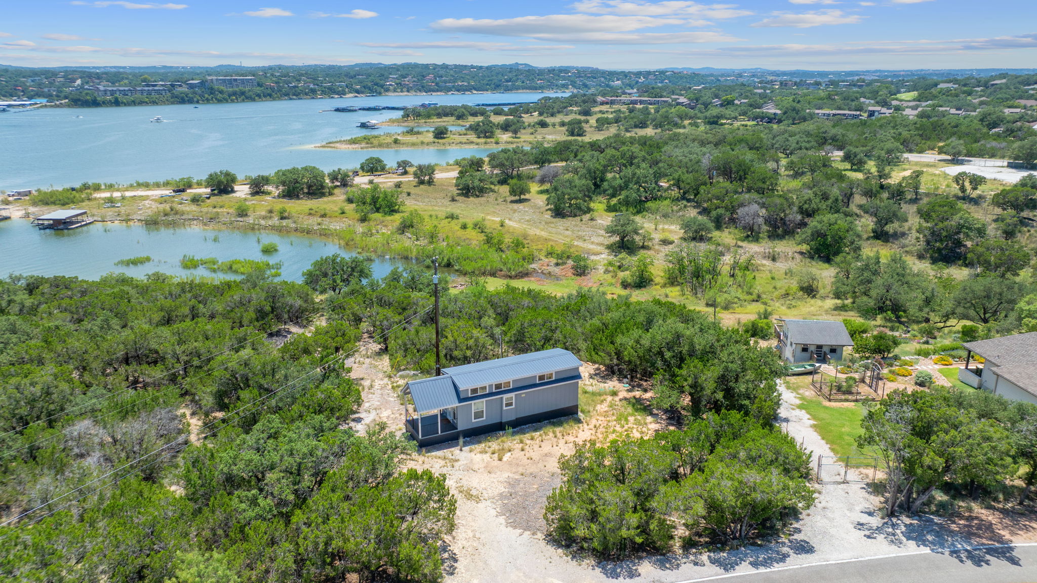 635 Ivean Pearson Road Lago Vista, TX 78645 - Photo 20 of 24 an aerial view of a houses with a lake view