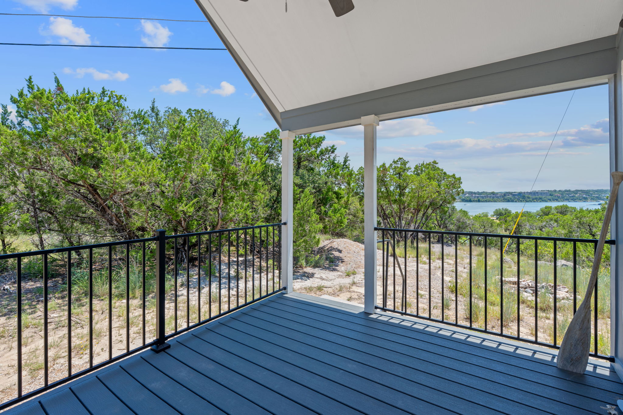 635 Ivean Pearson Road Lago Vista, TX 78645 - Photo 6 of 24 a view of a balcony with wooden floor