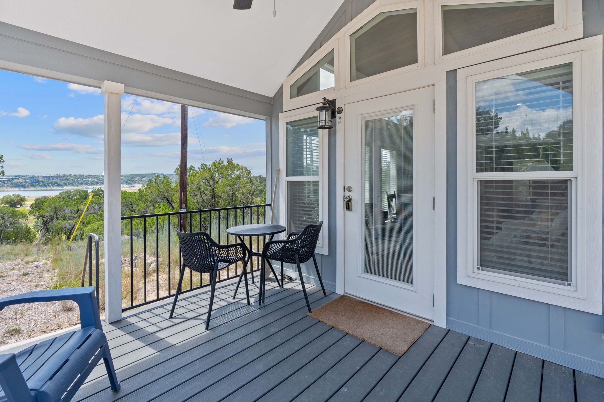 635 Ivean Pearson Road Lago Vista, TX 78645 - Photo 7 of 24 a view of a porch with wooden floor and outdoor seating