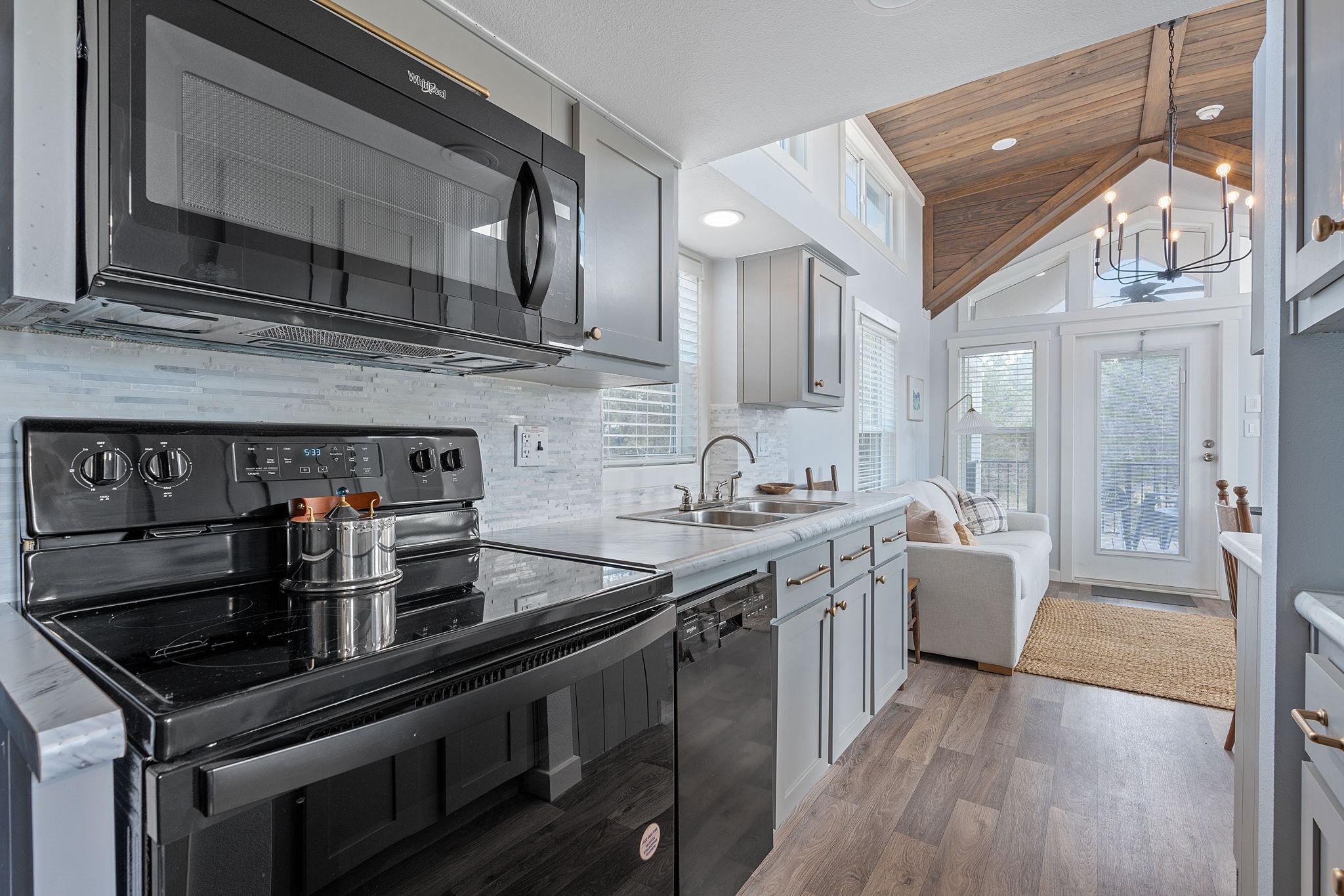 635 Ivean Pearson Road Lago Vista, TX 78645 - Photo 10 of 24 a kitchen with a stove and a sink