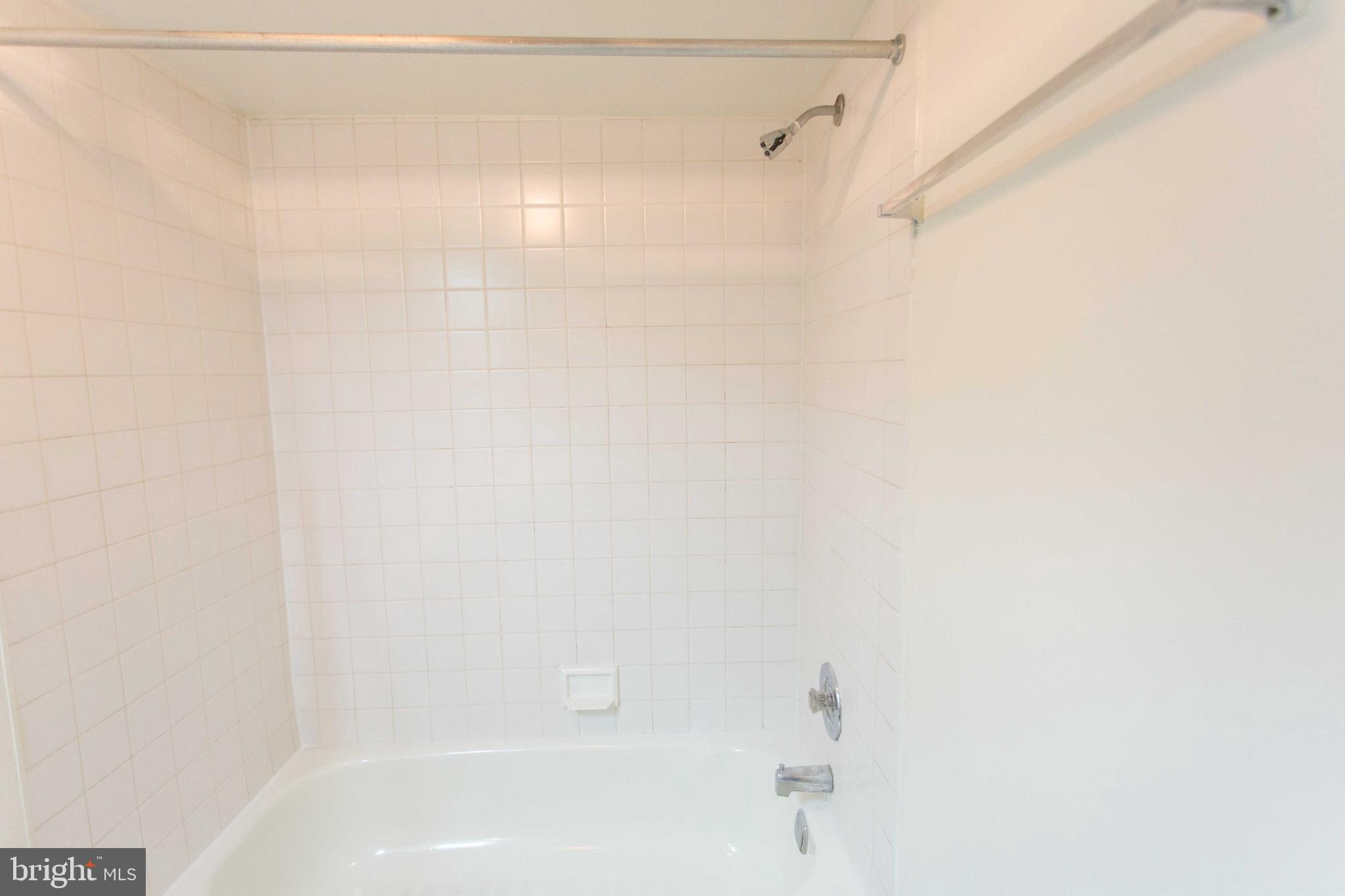 130-8 Arch Street, Unit 207 Philadelphia, PA 19106 - Photo 8 of 23 a bathroom with a shower and a shower