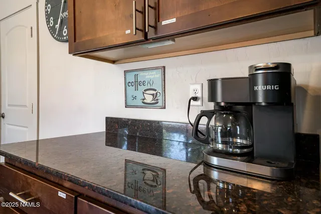 a kitchen with a stove and a microwave