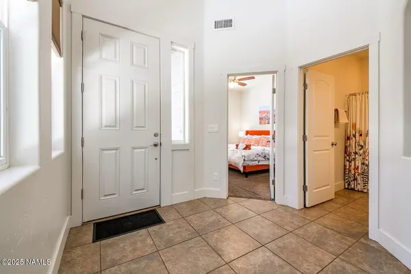a view of room with furniture and a window