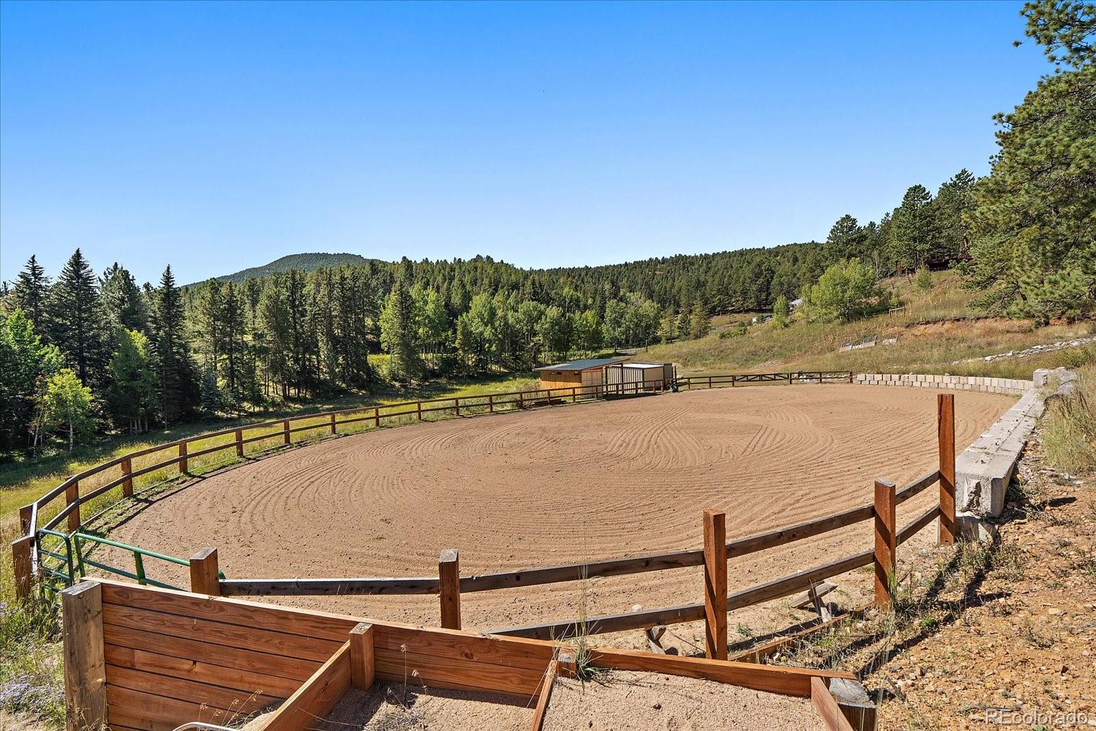 0 South Geronimo Trail Conifer, CO 80433 - Photo 15 of 34 a view of a swimming pool with a lake view