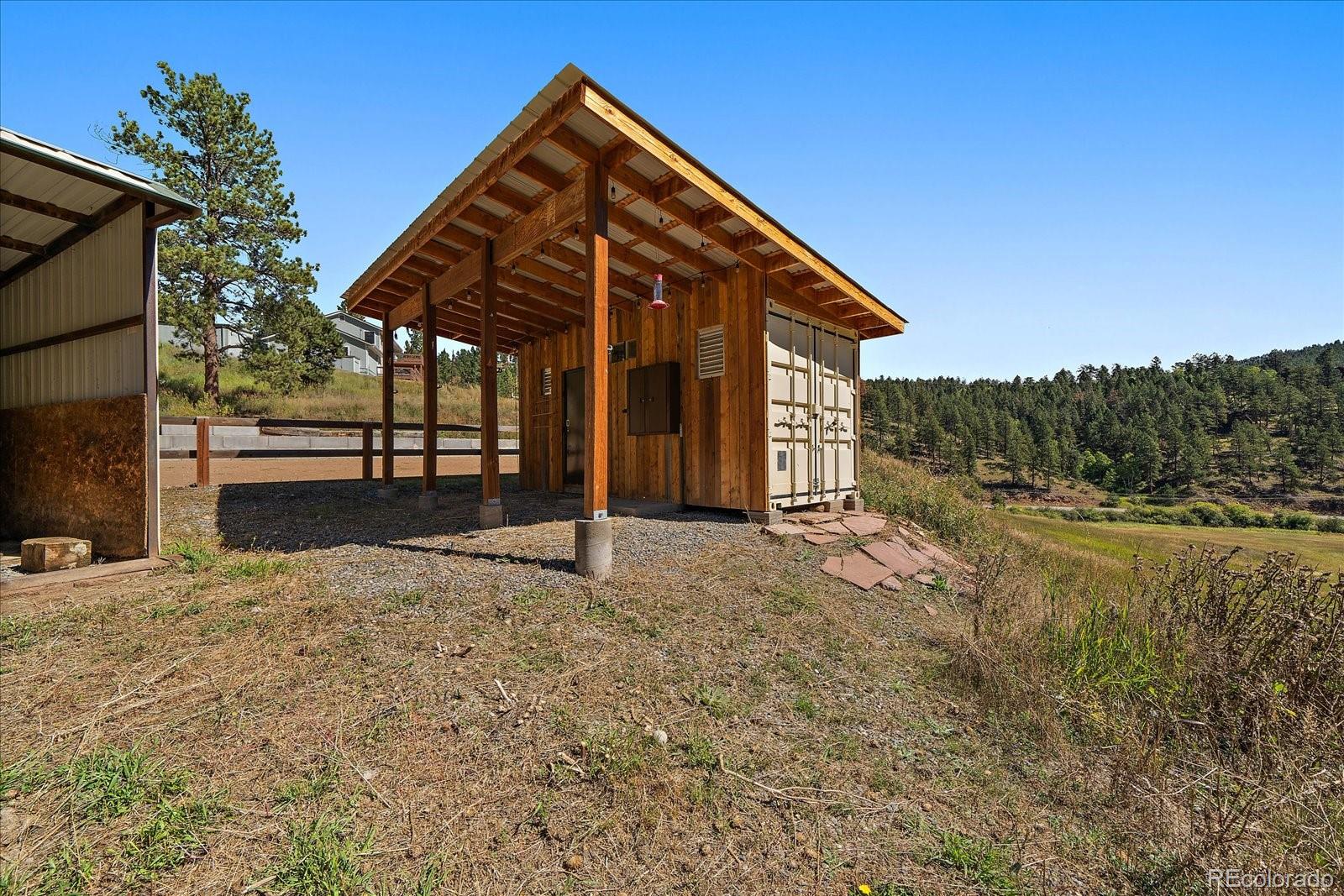 0 South Geronimo Trail Conifer, CO 80433 - Photo 17 of 34 a view of backyard of house