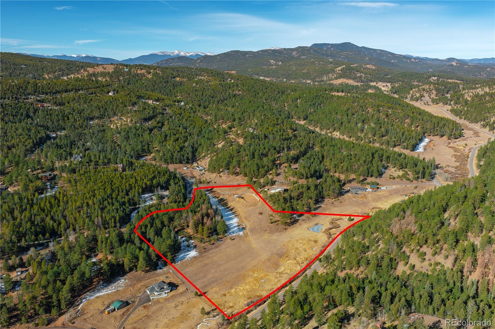 0 South Geronimo Trail Conifer, CO 80433 - Photo 5 of 34 an aerial view of residential houses with outdoor space and trees