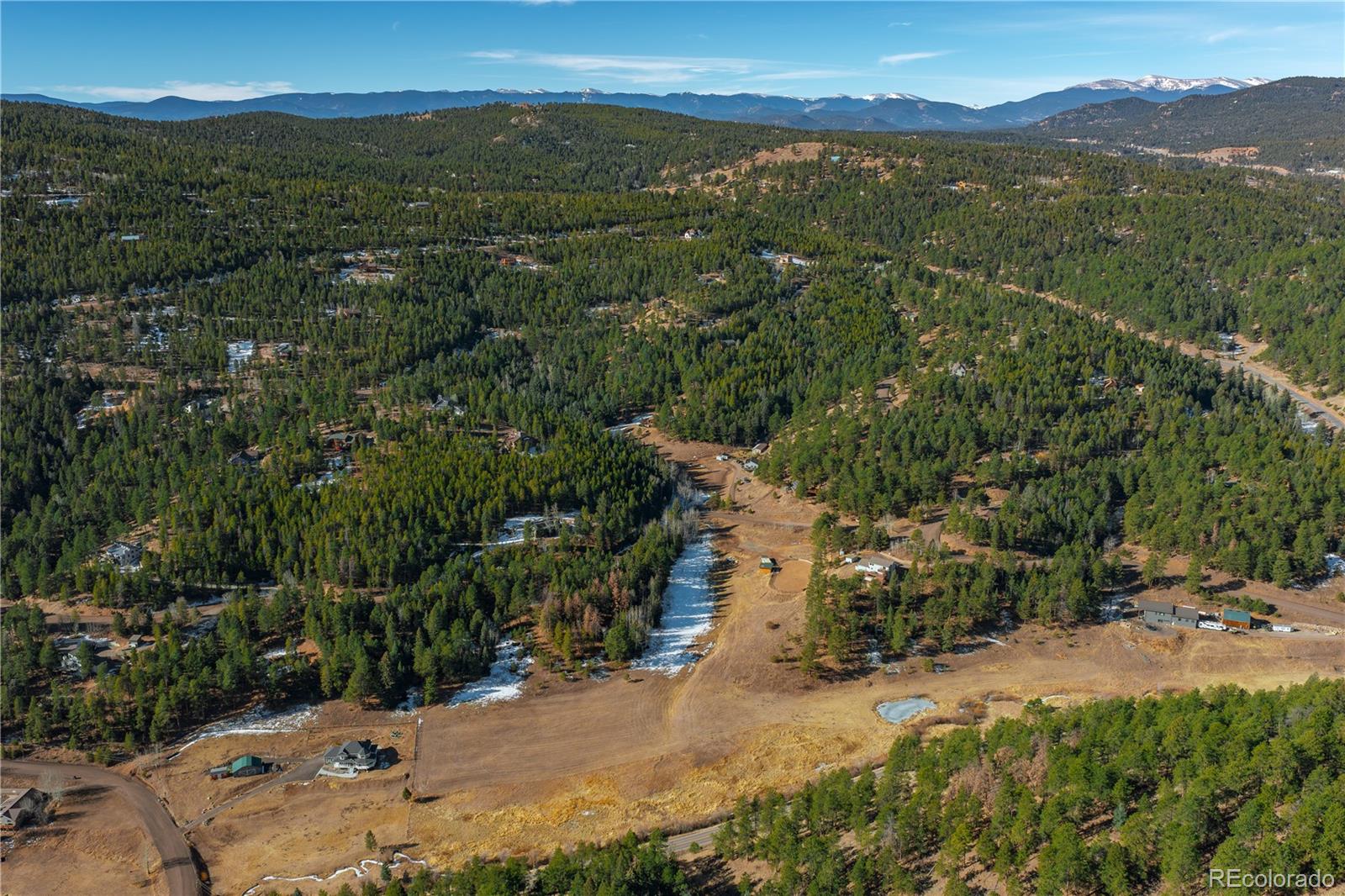 0 South Geronimo Trail Conifer, CO 80433 - Photo 6 of 34 a view of a city with mountains in the background
