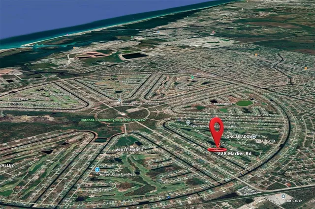 a view of a backyard of a house