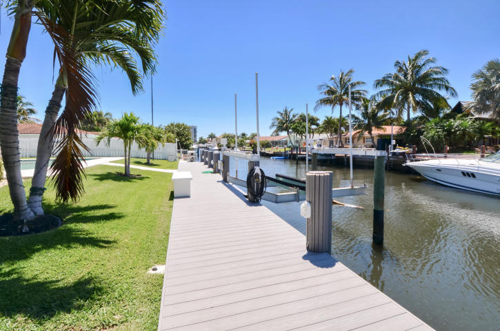 790 Forsyth Street Boca Raton, FL 33487 - Photo 6 of 27 a swimming pool with outdoor seating and yard