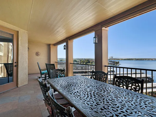 a view of a balcony dining area