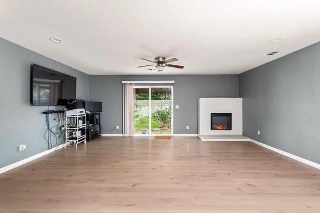 a view of livingroom with furniture and a fireplace