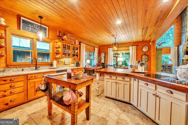a bathroom with double vanity and a mirror