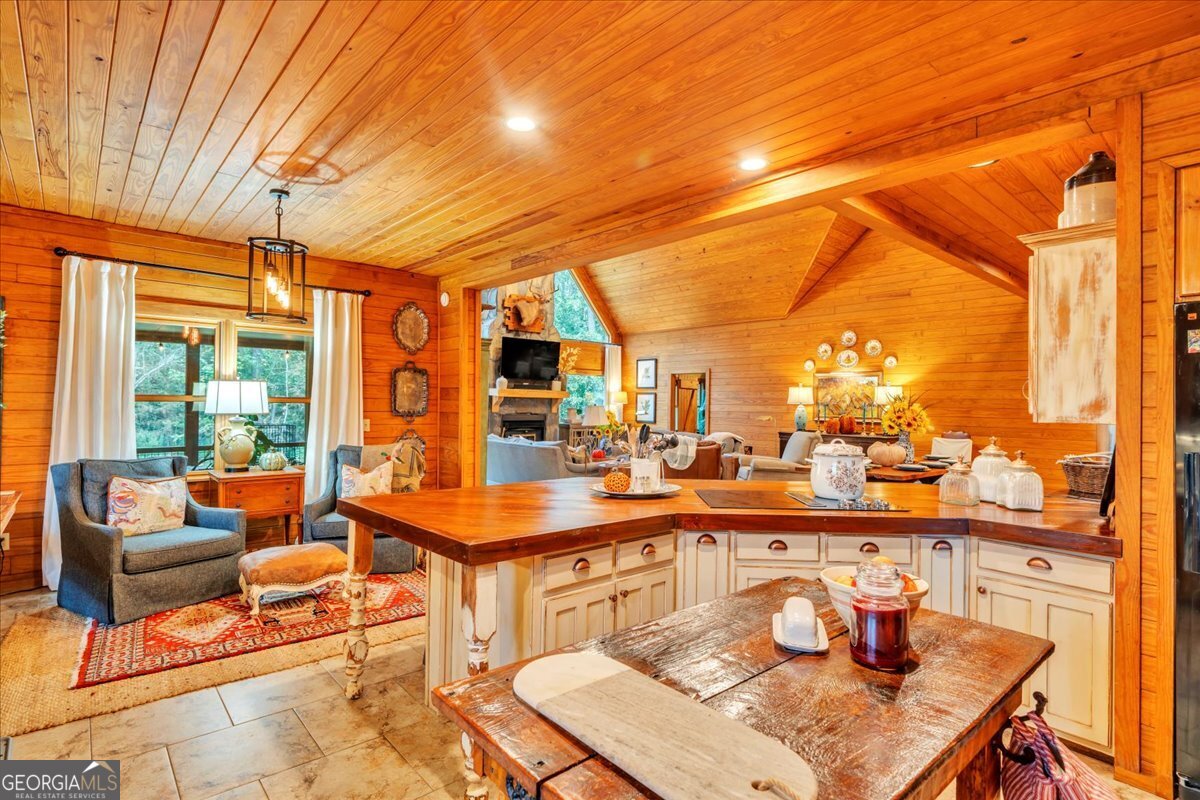 568 Hopewell Church Road Rhine, GA 31077 - Photo 12 of 77 a outdoor dining space with furniture and city view