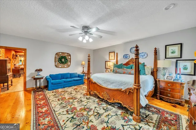 a view of balcony with furniture and garden