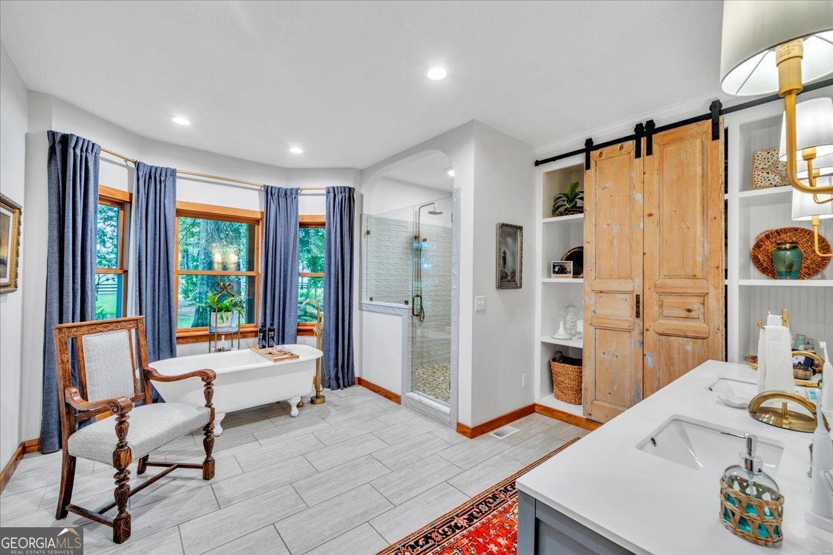 568 Hopewell Church Road Rhine, GA 31077 - Photo 21 of 77 a living room with furniture and large window