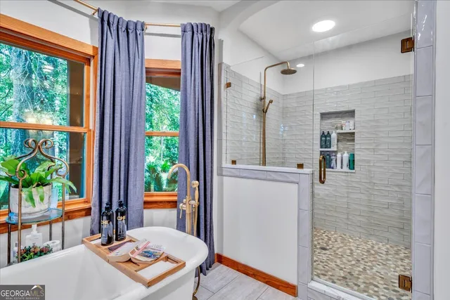 a view of a livingroom with furniture and gym equipment