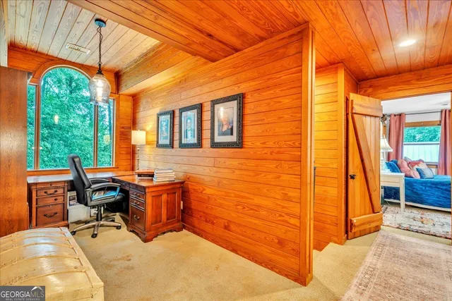 a view of a storage room with racks on the wall