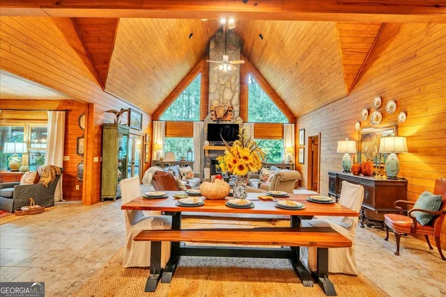a view of a patio with couches and potted plants