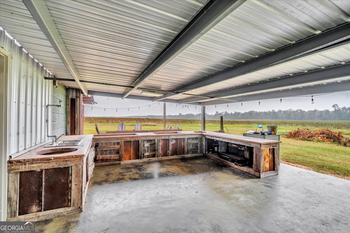 568 Hopewell Church Road Rhine, GA 31077 - Photo 47 of 77 a view of a room with a table and chairs