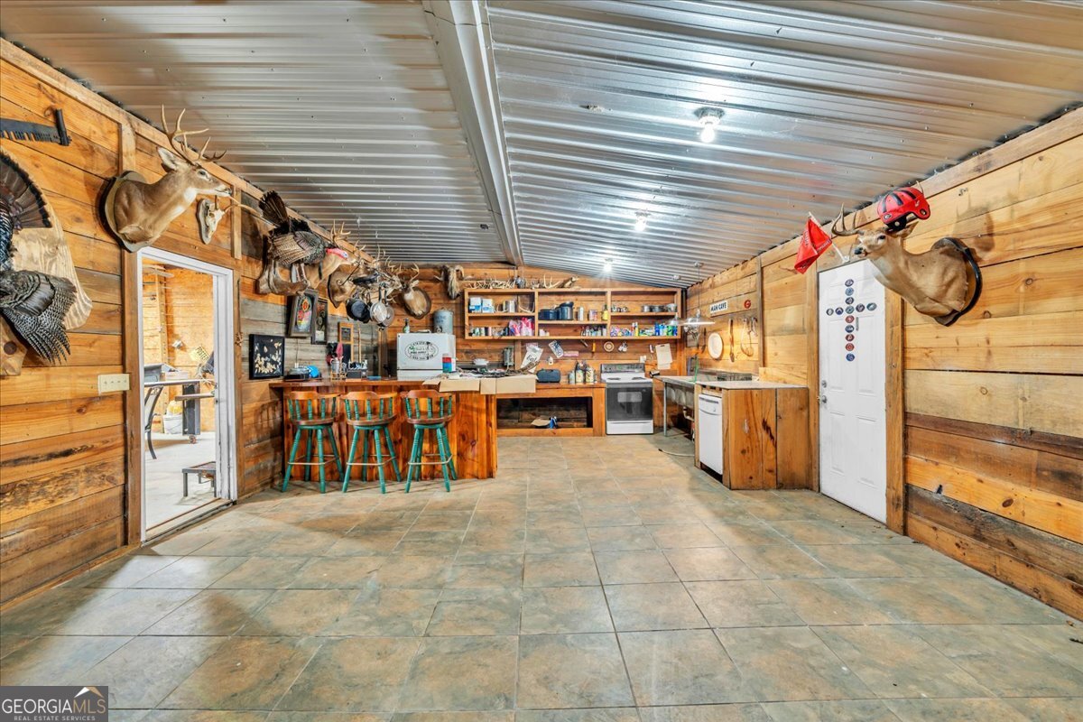 568 Hopewell Church Road Rhine, GA 31077 - Photo 50 of 77 a view of a storage room with racks on the wall
