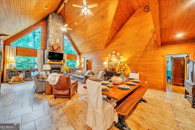 a large kitchen with stainless steel appliances granite countertop a sink and cabinets
