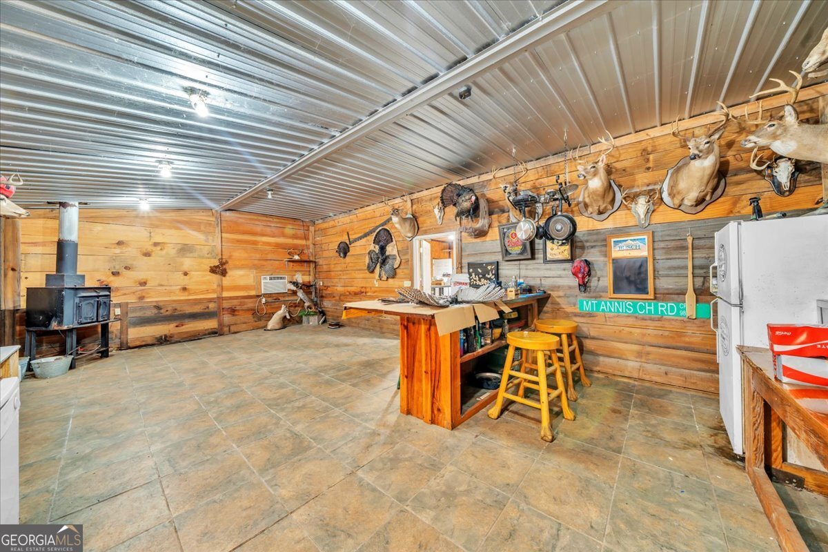 568 Hopewell Church Road Rhine, GA 31077 - Photo 52 of 77 a view of a patio with table and chairs