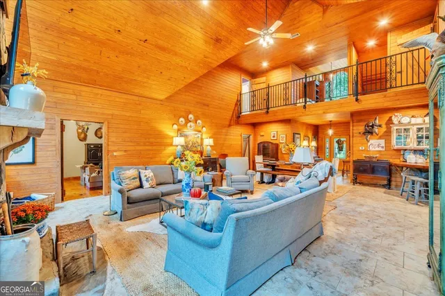 a outdoor dining space with furniture and city view