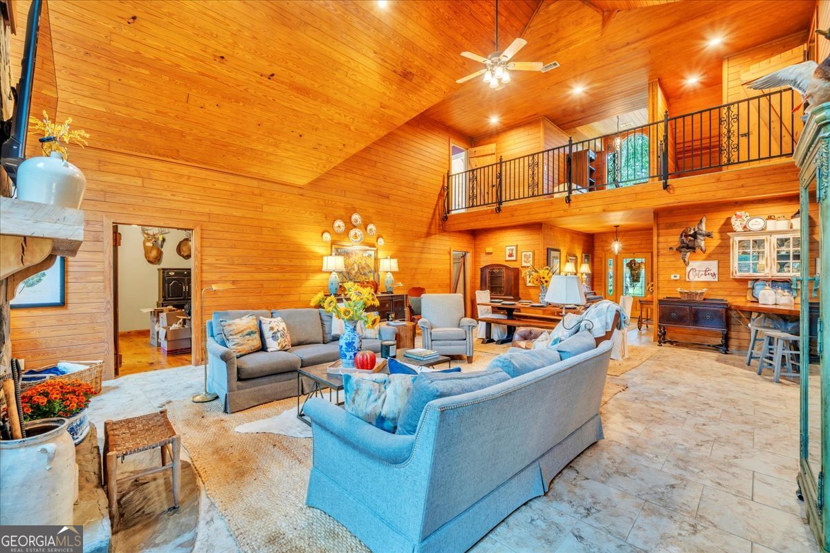 568 Hopewell Church Road Rhine, GA 31077 - Photo 6 of 77 a view of a patio with couches and potted plants