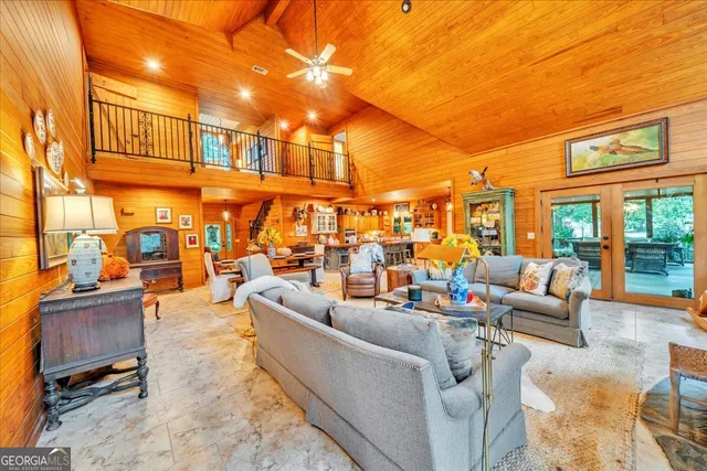 a bathroom with a granite countertop sink and a bathtub