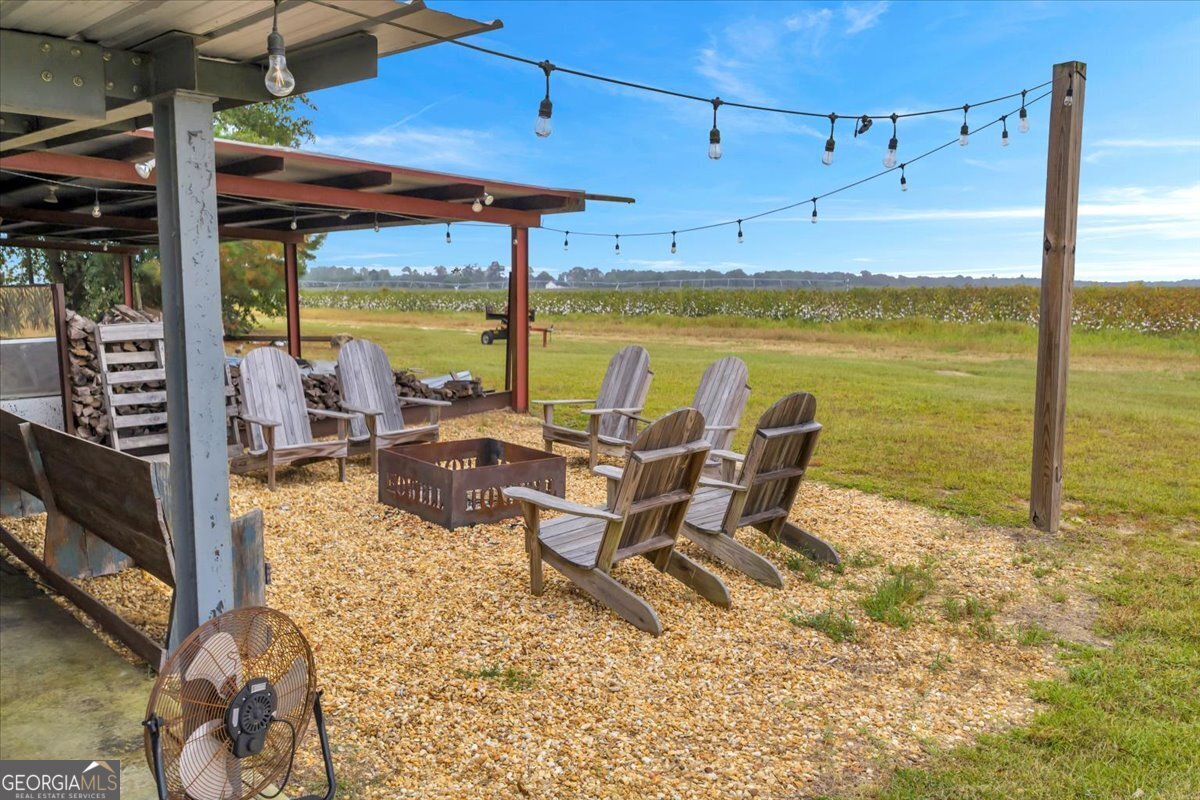 568 Hopewell Church Road Rhine, GA 31077 - Photo 74 of 77 a view of a swimming pool with outdoor seating